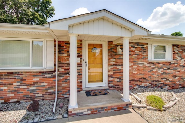 971 Cedar Dr, Wood River, IL 62095 - view of exterior entry featuring brick siding