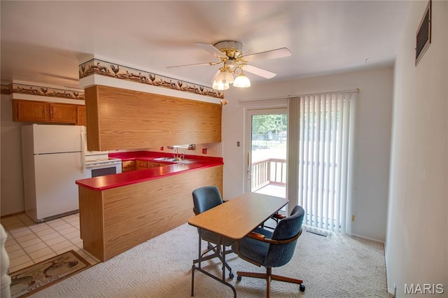 971 Cedar Dr, Wood River, IL 62095 - kitchen with white appliances, a ceiling fan, and brown cabinets