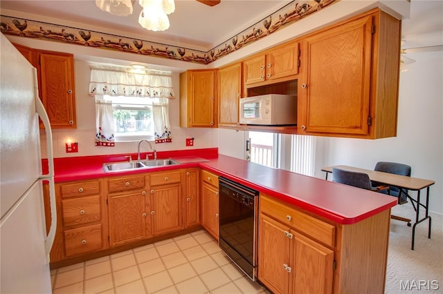 971 Cedar Dr, Wood River, IL 62095 - kitchen with white appliances, a peninsula, ceiling fan, brown cabinetry, and backsplash