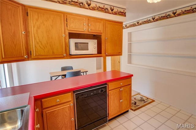 971 Cedar Dr, Wood River, IL 62095 - kitchen featuring dishwasher, white microwave, brown cabinets, and light countertops