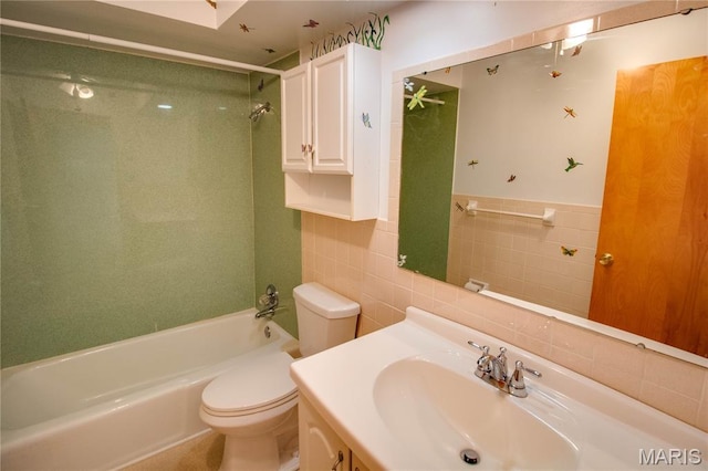 971 Cedar Dr, Wood River, IL 62095 - full bathroom with tile walls, vanity, and tub / shower combination
