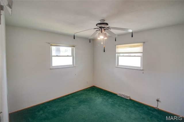 971 Cedar Dr, Wood River, IL 62095 - carpeted spare room with a ceiling fan and baseboards