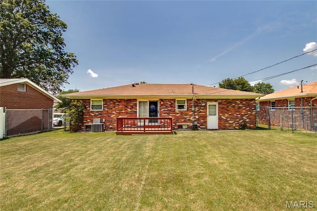 971 Cedar Dr, Wood River, IL 62095 - rear view of property with a wooden deck and brick siding