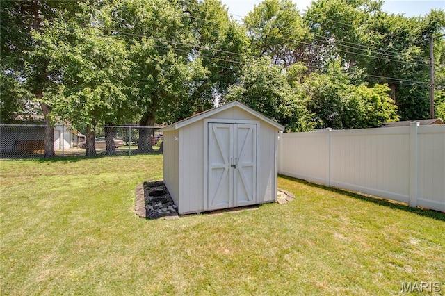 971 Cedar Dr, Wood River, IL 62095 - view of shed featuring a fenced backyard