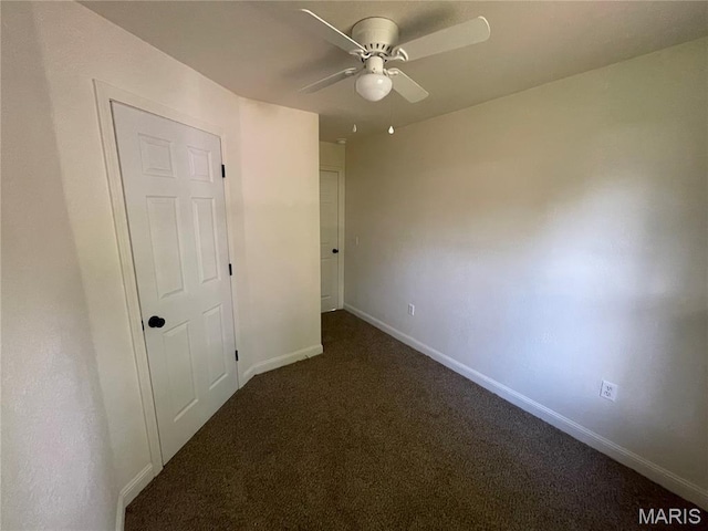 211 N Davis St, Cuba, MO 65453 - unfurnished bedroom featuring carpet floors and a ceiling fan