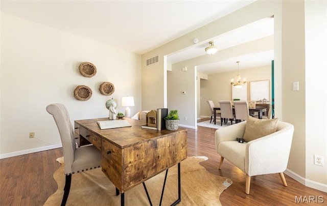 602 Whispering Willows Ct, Ballwin, MO 63021 - home office featuring a chandelier and light wood-style flooring