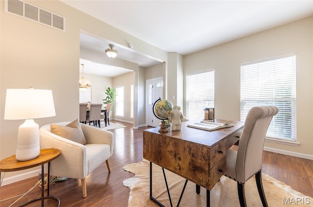 602 Whispering Willows Ct, Ballwin, MO 63021 - dining area with wood finished floors and a chandelier