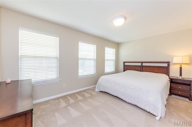 602 Whispering Willows Ct, Ballwin, MO 63021 - bedroom featuring light colored carpet and baseboards