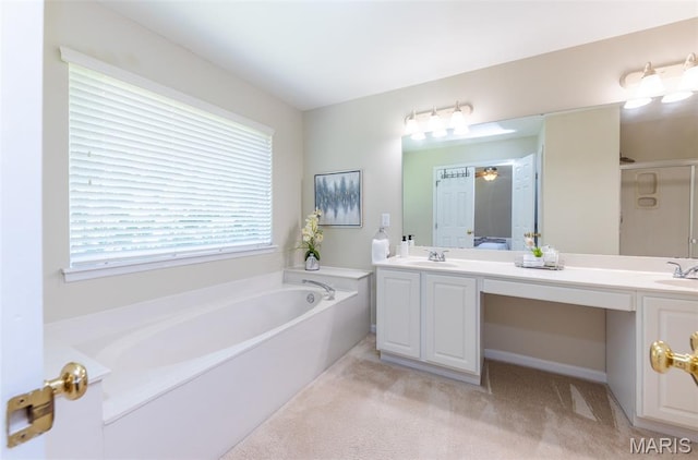 602 Whispering Willows Ct, Ballwin, MO 63021 - full bathroom with a garden tub, double vanity, and a shower stall