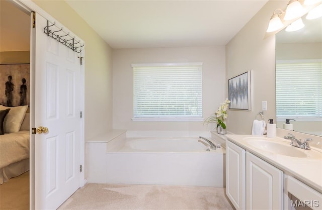 602 Whispering Willows Ct, Ballwin, MO 63021 - full bath featuring vanity, a garden tub, and ensuite bath
