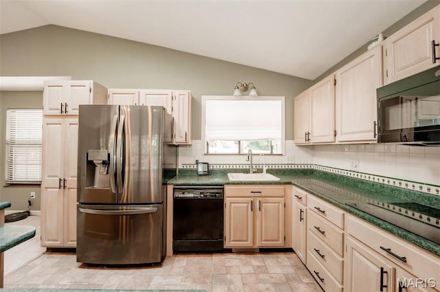 7040 Oak Shadow Ln, High Ridge, MO 63049 - kitchen featuring black appliances, vaulted ceiling, dark countertops, and backsplash