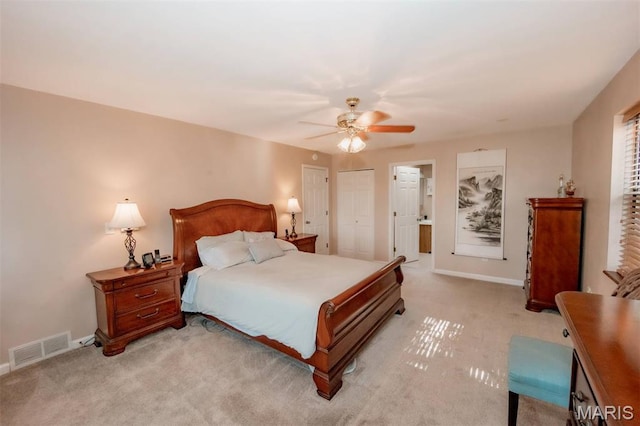 7040 Oak Shadow Ln, High Ridge, MO 63049 - bedroom featuring light colored carpet, a ceiling fan, and connected bathroom
