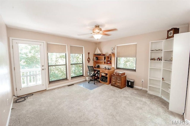 7040 Oak Shadow Ln, High Ridge, MO 63049 - office space featuring healthy amount of natural light, carpet, and a ceiling fan