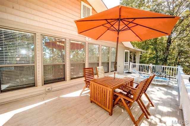 7040 Oak Shadow Ln, High Ridge, MO 63049 - wooden terrace with outdoor dining area