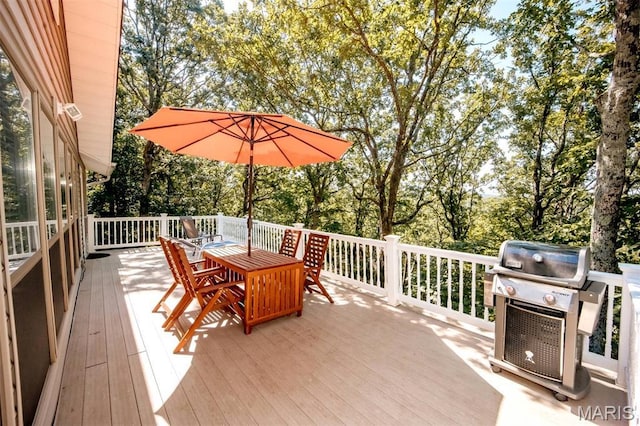 7040 Oak Shadow Ln, High Ridge, MO 63049 - wooden terrace with outdoor dining area, grilling area, and view of scattered trees