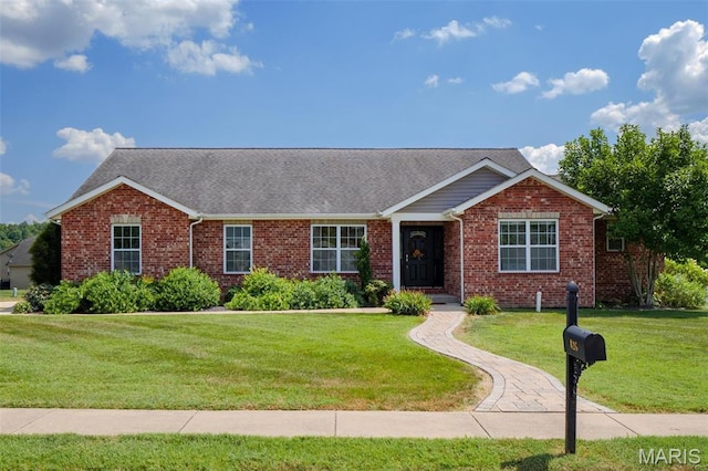 126 Maxwell Dr, Columbia, IL 62236 - single story home with brick siding, a front yard, and roof with shingles