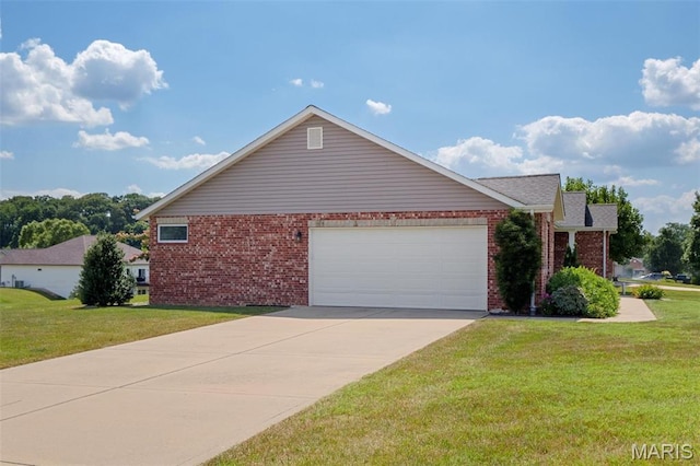 126 Maxwell Dr, Columbia, IL 62236 - view of home's exterior with brick siding, an attached garage, and a yard