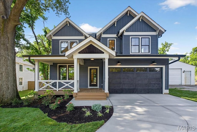 804 E Pacific Ave, Webster Groves, MO 63119 - craftsman inspired home featuring a porch, a garage, and concrete driveway