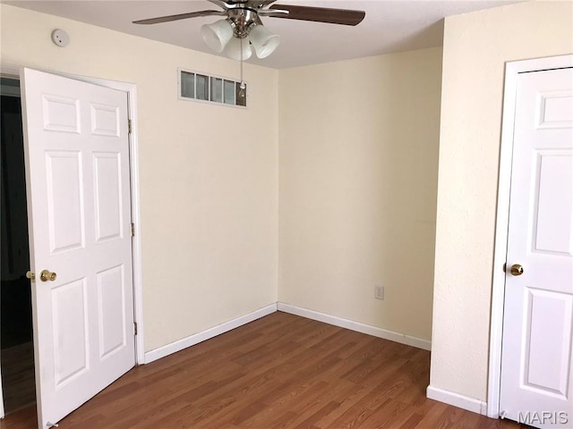 1462 Windle Rd, Cuba, MO 65453 - empty room with ceiling fan and wood finished floors