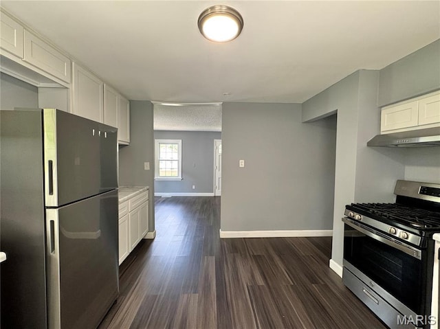 4404 Saint Leo Ln, Saint Ann, MO 63074 - kitchen with stainless steel appliances, under cabinet range hood, white cabinets, dark wood-style flooring, and light countertops