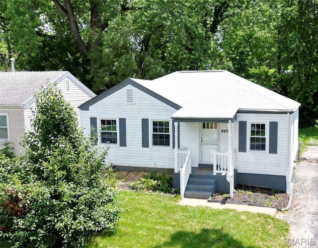 4404 Saint Leo Ln, Saint Ann, MO 63074 - view of front of property with a front yard