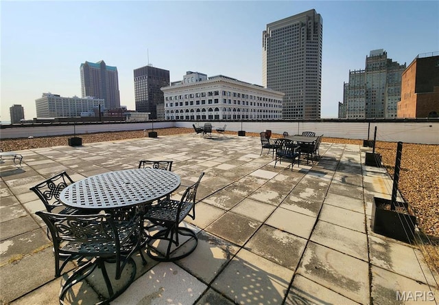1010 Saint Charles St Unit 802, Saint Louis, MO 63101 - view of patio / terrace with outdoor dining area and a view of skyline