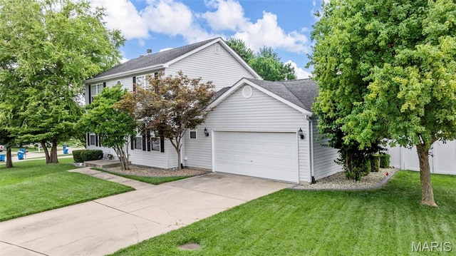 2330 Eagle Pines Dr, Saint Charles, MO 63303 - view of front of house with an attached garage, driveway, and a front yard