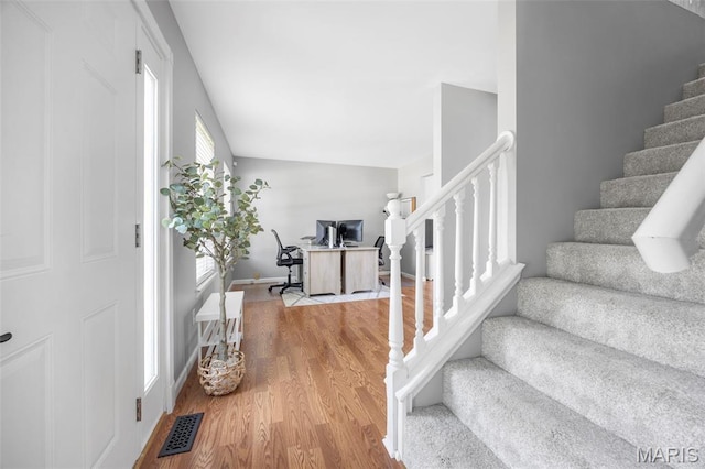 2330 Eagle Pines Dr, Saint Charles, MO 63303 - entryway with stairway and wood finished floors