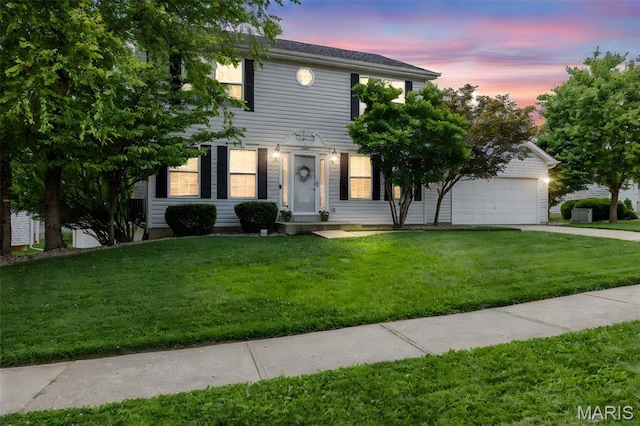 2330 Eagle Pines Dr, Saint Charles, MO 63303 - colonial house with driveway and a lawn