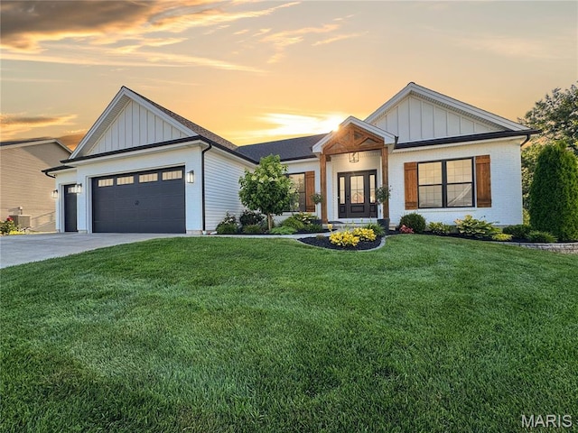 2803 Poolbrook Way, Washington, MO 63090 - modern farmhouse style home with board and batten siding, an attached garage, a front yard, and driveway