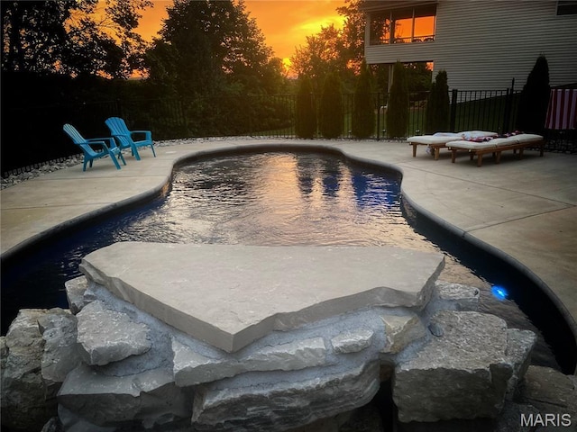2803 Poolbrook Way, Washington, MO 63090 - pool at dusk with a fenced backyard and a patio