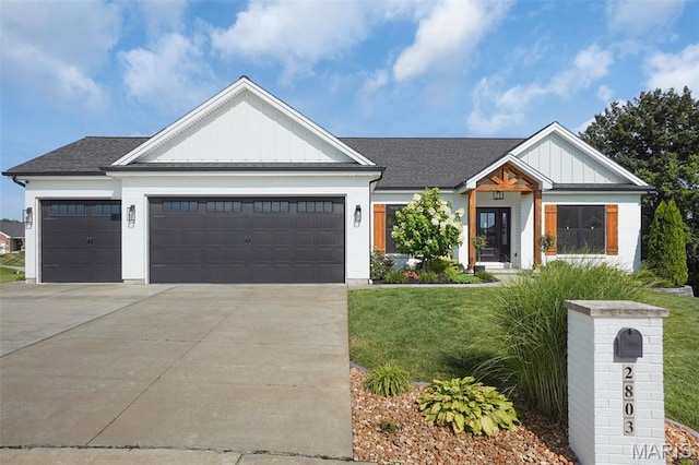 2803 Poolbrook Way, Washington, MO 63090 - modern farmhouse with board and batten siding, an attached garage, driveway, and a front lawn
