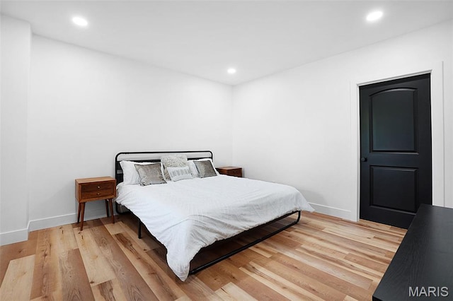 2803 Poolbrook Way, Washington, MO 63090 - bedroom with light wood-style flooring and recessed lighting