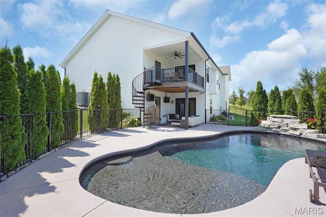2803 Poolbrook Way, Washington, MO 63090 - back of property featuring a ceiling fan, stairs, a fenced backyard, a patio, and a balcony