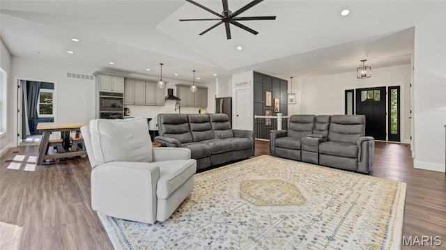 5065 Fox Bridge Rd, Wildwood, MO 63069 - living area with ceiling fan, vaulted ceiling, recessed lighting, and wood finished floors
