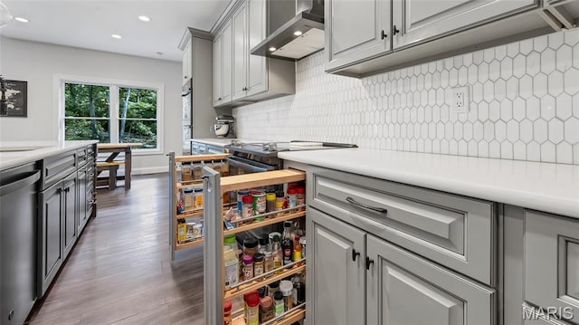 5065 Fox Bridge Rd, Wildwood, MO 63069 - kitchen featuring wall chimney exhaust hood, gray cabinets, dishwasher, dark wood-style flooring, and light countertops