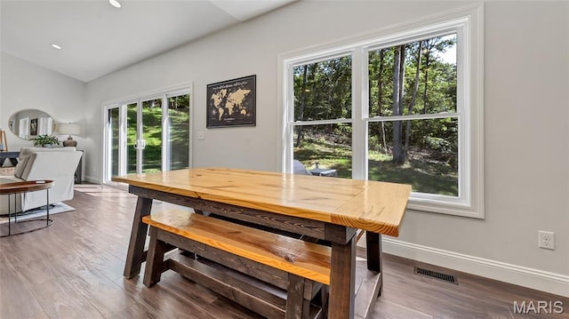 5065 Fox Bridge Rd, Wildwood, MO 63069 - dining area with wood finished floors and lofted ceiling