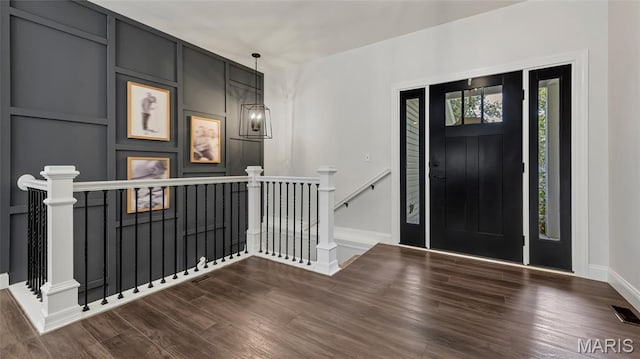 5065 Fox Bridge Rd, Wildwood, MO 63069 - foyer with baseboards and dark wood-style floors