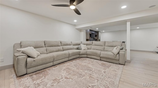 5065 Fox Bridge Rd, Wildwood, MO 63069 - living area with wood finished floors, a ceiling fan, and recessed lighting