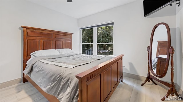 5065 Fox Bridge Rd, Wildwood, MO 63069 - bedroom with light wood-type flooring and ceiling fan