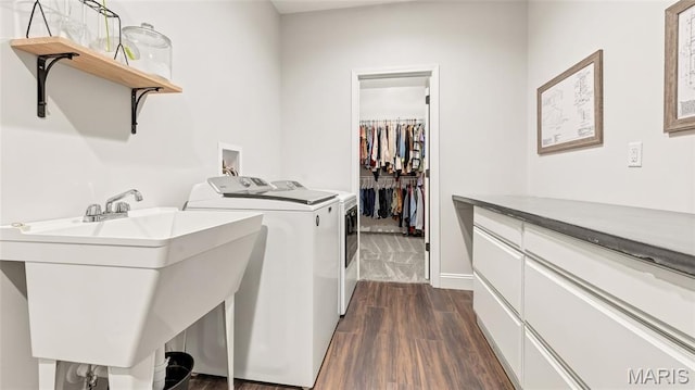 5065 Fox Bridge Rd, Wildwood, MO 63069 - washroom featuring dark wood-style floors and washer and clothes dryer