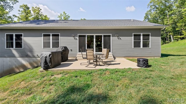 5065 Fox Bridge Rd, Wildwood, MO 63069 - back of house featuring a patio and a lawn