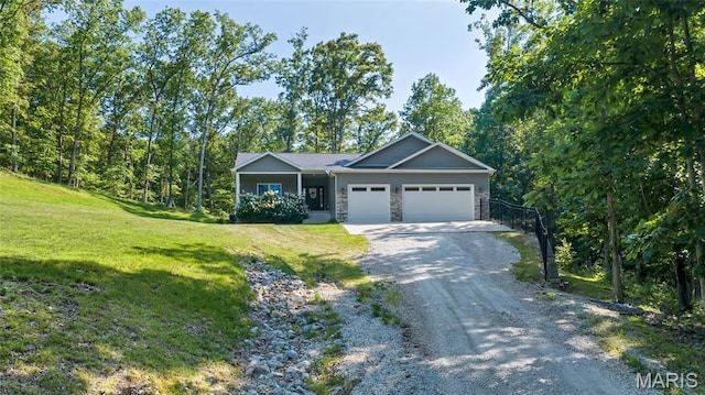 5065 Fox Bridge Rd, Wildwood, MO 63069 - view of front of property with a garage, a front lawn, and driveway