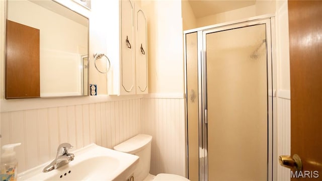 2480 Cambridge Dr, Florissant, MO 63033 - bathroom with a stall shower and a wainscoted wall