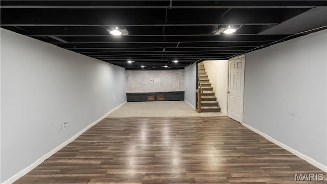2480 Cambridge Dr, Florissant, MO 63033 - finished basement with stairway and wood finished floors
