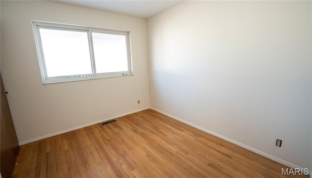 2480 Cambridge Dr, Florissant, MO 63033 - empty room with light wood-type flooring and baseboards
