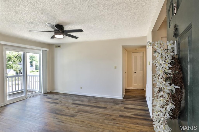160 Jubilee Hill Dr Unit G, Grover, MO 63040 - empty room featuring dark wood-style floors, a textured ceiling, and a ceiling fan