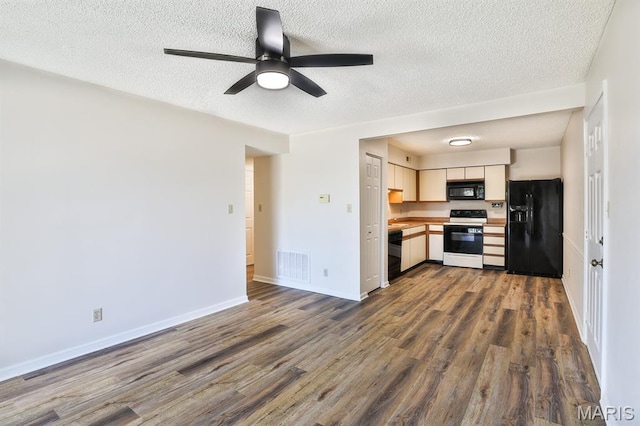 160 Jubilee Hill Dr Unit G, Grover, MO 63040 - kitchen featuring black appliances, dark wood-style flooring, ceiling fan, and a textured ceiling