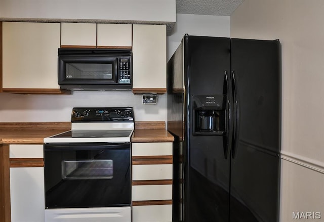 160 Jubilee Hill Dr Unit G, Grover, MO 63040 - kitchen with black appliances, white cabinets, and butcher block counters