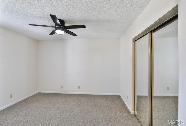 160 Jubilee Hill Dr Unit G, Grover, MO 63040 - unfurnished bedroom with a textured ceiling, carpet flooring, a closet, and a ceiling fan